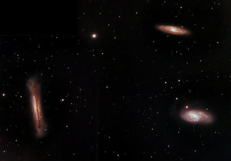 Stunning view of three galaxies in a vast expanse of stars.